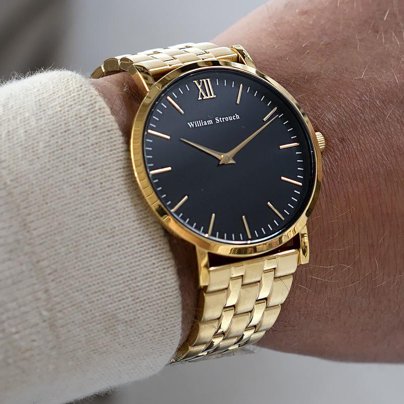 CLASSIC GOLD AND BLACK WATCH